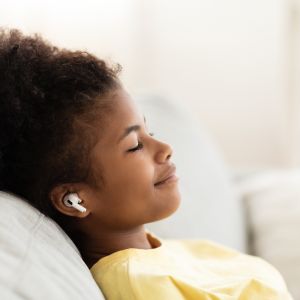 Calm person wearing audio buds