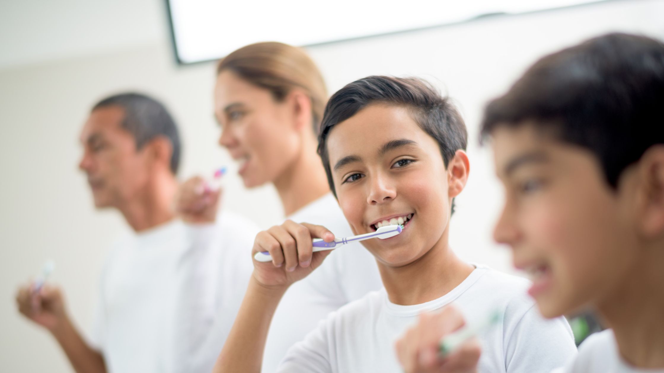 Westlake Family Dental Care - Family Brushing Teeth